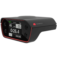 The RaceBox Pro: a wedge-shaped black unit with a display showing a running lap time.